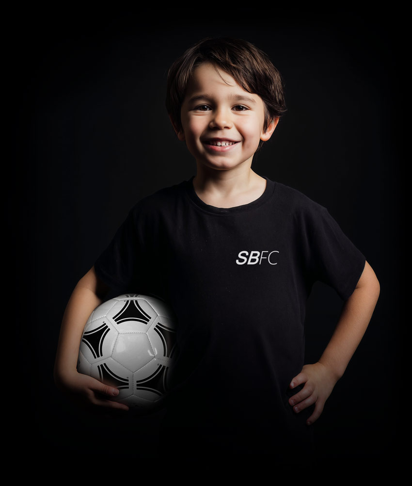 SBFC Little BALR posing with soccer ball
