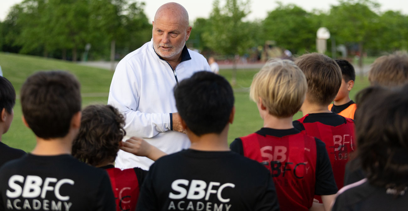 Coach David Zonneveld giving instructions to Youth Soccer players during a practice for SBFC Academy in Burlington Ontario